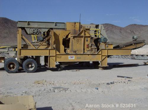 USED: Kue-Ken 25 x 42 Big Bite portable jaw crusher with SimplicityEngineering 46 x 16 VGF removable feeder hopper. 42" under jaw belt.Internal mechanical lube system with external filter.