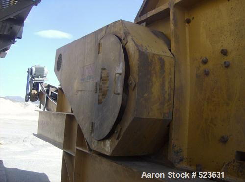 USED: Kue-Ken 25 x 42 Big Bite portable jaw crusher with SimplicityEngineering 46 x 16 VGF removable feeder hopper. 42" under jaw belt.Internal mechanical lube system with external filter.