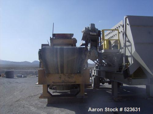 USED: Kue-Ken 25 x 42 Big Bite portable jaw crusher with SimplicityEngineering 46 x 16 VGF removable feeder hopper. 42" under jaw belt.Internal mechanical lube system with external filter.