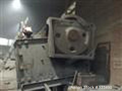 USED: Morgadshammer jaw crusher, type AR 180. Material of construction is carbon steel. Input size 70.2" x 54.6" (1800mm x 1400mm). Belt driven by 225 hp/150 kw - 600 volt/50 cycle/3 ph motor.