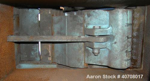 Used Morse Brothers Machinery 4 x 6 jaw crusher, carbon steel. Top feed hopper. Approximate capacity range of 400-900 pounds per hour reducing product to 1/4". Driven by a 3 hp, 3/230/460, 1740 rpm m...