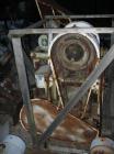 Used Bacon 6 x 3 Jaw Crusher, Carbon Steel. Approximate  5 hp drive. Mounted on a stand.