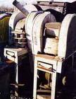 Used Bacon 6 x 3 Jaw Crusher, Carbon Steel. Approximate  5 hp drive. Mounted on a stand.
