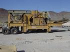 USED: Kue-Ken 25 x 42 Big Bite portable jaw crusher with SimplicityEngineering 46 x 16 VGF removable feeder hopper. 42