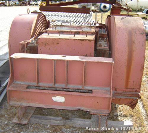 Used-Gruendler Dual Roll Crusher.  Rolls are 24" wide X approximately 16" diameter. Each roll is driven by a separate 15 hp,...
