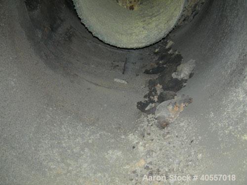 Used Cyclone, carbon steel. Approximately 36" diameter x 46" straight side x 43" coned bottom. Openings: side 16", 16 1/2" x 15"; 6" center bottom outlet. Side access doors.