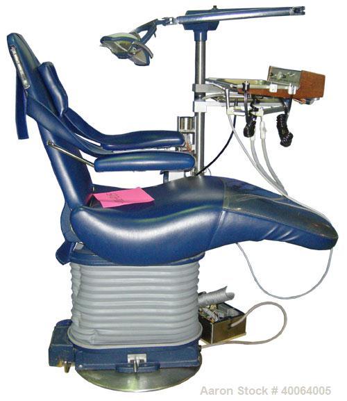 Used: Dental EZ Operatory Dental Chair, Model JS. Includes foot pedal controls, A-DEC delivery station, power source, and a Pelton and Crane light. 
