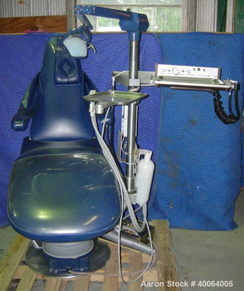 Used: Dental EZ Operatory Dental Chair, Model JS. Includes foot pedal controls, A-DEC delivery station, power source, and a Pelton and Crane light. 
