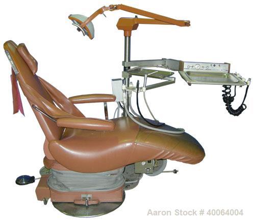 Used: Dental EZ Operatory Dental Chair, Model JS. Includes foot pedal controls, A-DEC delivery station, power source, and a Pelton and Crane light.
