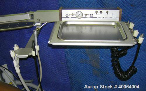 Used: Dental EZ Operatory Dental Chair, Model JS. Includes foot pedal controls, A-DEC delivery station, power source, and a Pelton and Crane light.