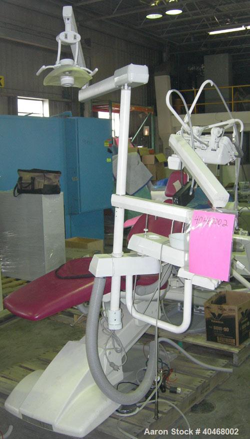 Used Proma dental chair, model XL. 60 hz, 120 volt, 6.9 amp max. Includes foot pedal controls, light, tool tray and cuspidor. UL Listed.