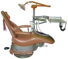 Used: Dental EZ Operatory Dental Chair, Model JS. Includes foot pedal controls, A-DEC delivery station, power source, and a Pelton and Crane light.
