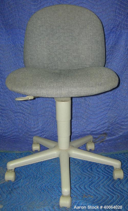 Used Receptionist Chair On Casters.  Manually operated raise/lower and manually operated backrest settings. 