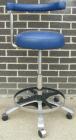 Used Dentsply blue assistant stool.  Mounted on casters.