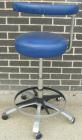 Used Dentsply blue assistant stool.  Mounted on casters.