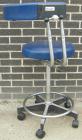 Used Dentsply blue assistant stool.  Mounted on casters.