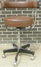 Used Dentsply Classic assistant stool with manually adjustable arm rest.