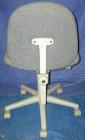 Used Receptionist Chair On Casters.  Manually operated raise/lower and manually operated backrest settings. 