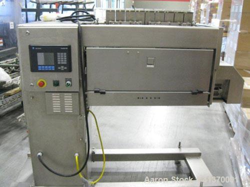 Used Grote S/A-530E Slicer is designed of stainless steel construction and is cantilevered to roll directly over a belt conveyor.  Operation is simple and easily controlled with a user-friendly keypa...
