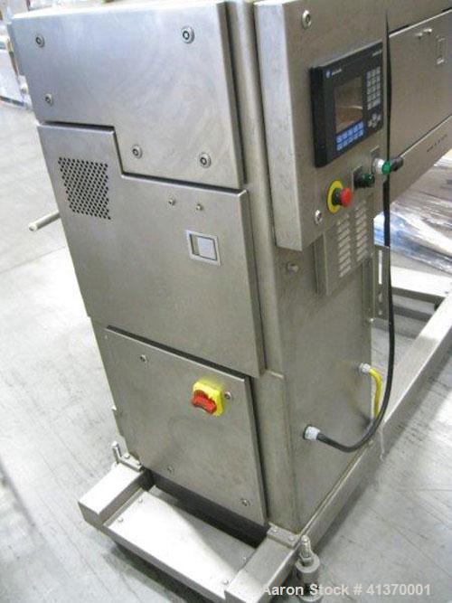 Used Grote S/A-530E Slicer is designed of stainless steel construction and is cantilevered to roll directly over a belt conveyor.  Operation is simple and easily controlled with a user-friendly keypa...