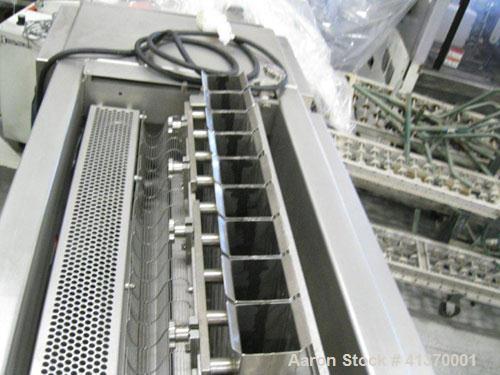Used Grote S/A-530E Slicer is designed of stainless steel construction and is cantilevered to roll directly over a belt conveyor.  Operation is simple and easily controlled with a user-friendly keypa...