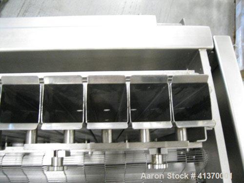 Used Grote S/A-530E Slicer is designed of stainless steel construction and is cantilevered to roll directly over a belt conveyor.  Operation is simple and easily controlled with a user-friendly keypa...