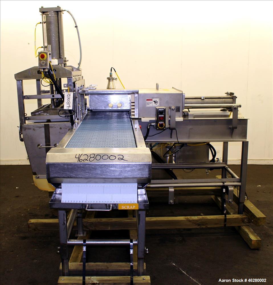 Used- Marchant Schmidt Pneumatic Cheese Cubing Machine, Model MS80. Machine is rated at speeds up to 10,000 pounds per hour....