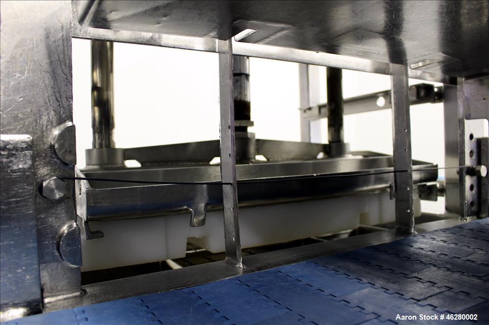 Used Marchant Schmidt Pneumatic Cheese Cubing Machine, Model MS80. Machine is rated at speeds up to 10,000 pounds per hour. Handles (2) 40 pound blocks of cheese, 2 blocks per cycle. Designed for har...