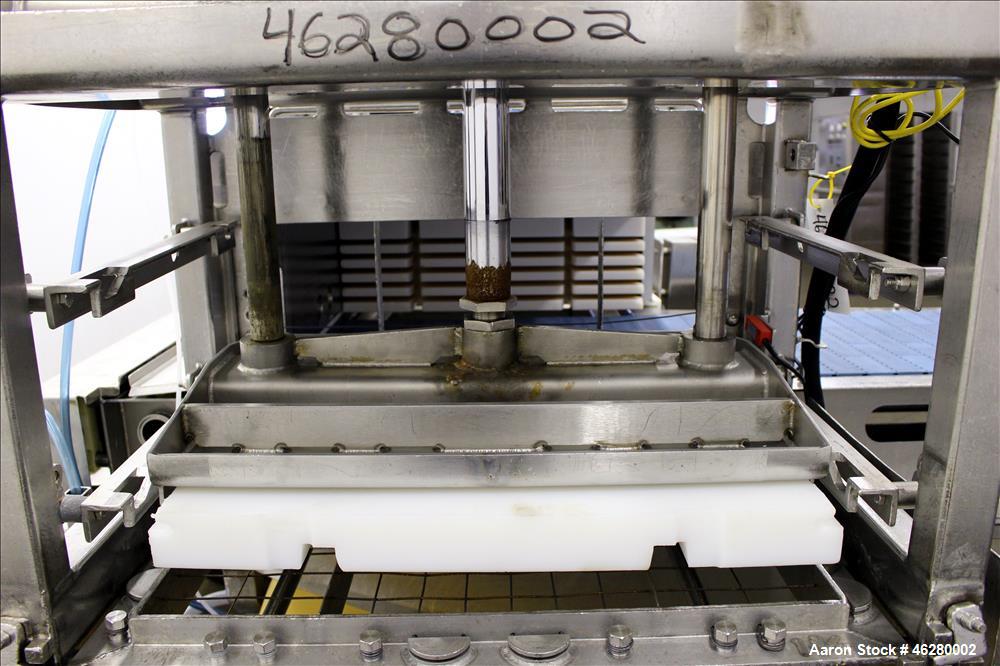 Used Marchant Schmidt Pneumatic Cheese Cubing Machine, Model MS80. Machine is rated at speeds up to 10,000 pounds per hour. Handles (2) 40 pound blocks of cheese, 2 blocks per cycle. Designed for har...