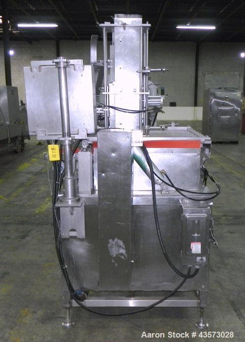 Used Meat Machinery Manufacturers Meat Slicer. Mounted on a stainless steel frame.