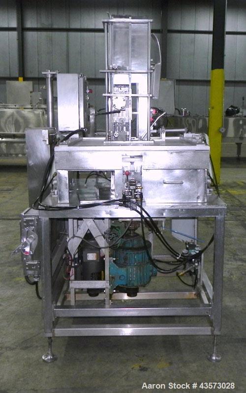 Used Meat Machinery Manufacturers Meat Slicer. Mounted on a stainless steel frame.