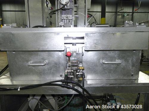 Used Meat Machinery Manufacturers Meat Slicer. Mounted on a stainless steel frame.