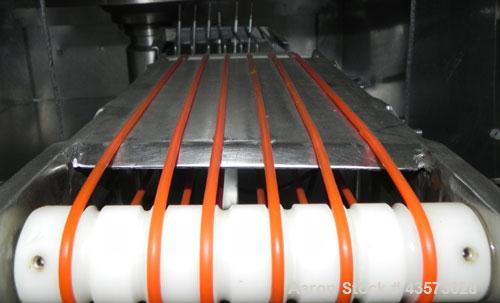 Used Meat Machinery Manufacturers Meat Slicer. Mounted on a stainless steel frame.
