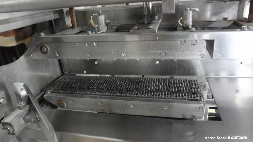 Used Meat Machinery Manufacturers Meat Slicer. Mounted on a stainless steel frame.