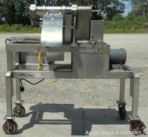 Used Urschel Slicer, Model H-A, Stainless Steel.  12 crosscut knives and 17 circular knives spaced 3/8". Sliced thickness rated 1/8" to 1". Driven by a 2 hp, 3/60/208-230/460 volt, 1725 rpm.  Mounted...