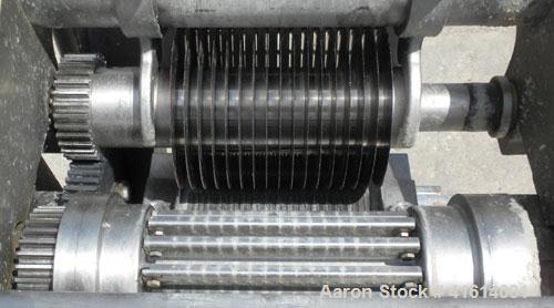 Used Urschel Slicer, Model H-A, Stainless Steel.  12 crosscut knives and 17 circular knives spaced 3/8". Sliced thickness rated 1/8" to 1". Driven by a 2 hp, 3/60/208-230/460 volt, 1725 rpm.  Mounted...
