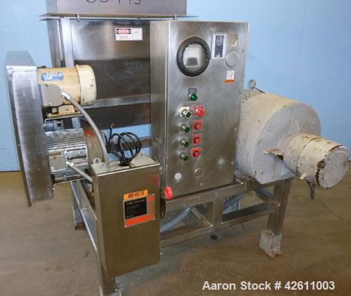 Used Urschel Model 2100 Comitrol Slicer. Urcshel 66755 3K030240U stainless steel cutting head. 30'' Deep stainless steel hopper with 22'' x 30'' infeed opening. Blunt blade horizontal agitator and st...