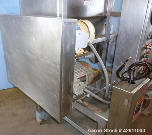 Used Urschel Model 2100 Comitrol Slicer. Urcshel 66755 3K030240U stainless steel cutting head. 30'' Deep stainless steel hopper with 22'' x 30'' infeed opening. Blunt blade horizontal agitator and st...