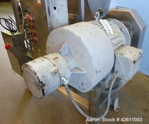 Used Urschel Model 2100 Comitrol Slicer. Urcshel 66755 3K030240U stainless steel cutting head. 30'' Deep stainless steel hopper with 22'' x 30'' infeed opening. Blunt blade horizontal agitator and st...