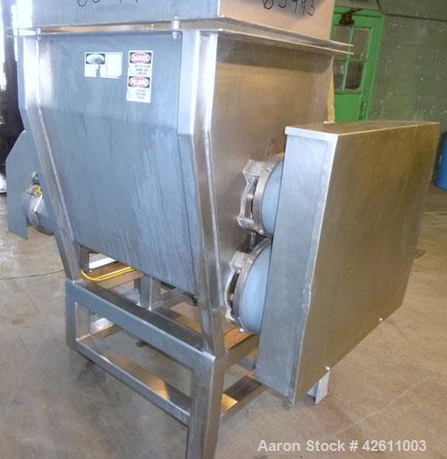 Used Urschel Model 2100 Comitrol Slicer. Urcshel 66755 3K030240U stainless steel cutting head. 30'' Deep stainless steel hopper with 22'' x 30'' infeed opening. Blunt blade horizontal agitator and st...