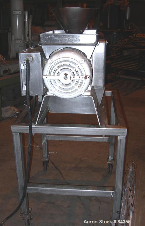 USED: Urschel Comitrol processor, model 3600, 316 stainless steel. 3 blade impeller, 6" inside diameter x approx 3" deep microcut cutting head. Top feed with pan and hopper, 3" diameter x 4" long scr...