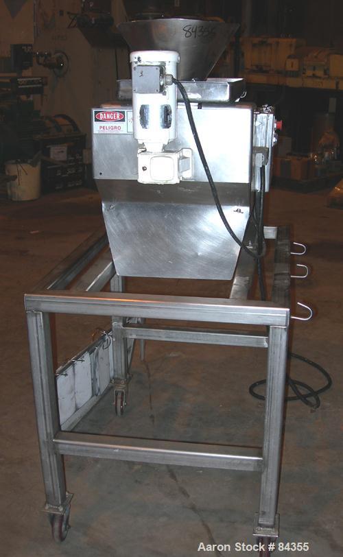 USED: Urschel Comitrol processor, model 3600, 316 stainless steel. 3 blade impeller, 6" inside diameter x approx 3" deep microcut cutting head. Top feed with pan and hopper, 3" diameter x 4" long scr...