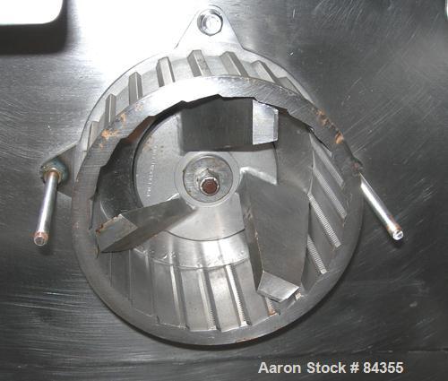 USED: Urschel Comitrol processor, model 3600, 316 stainless steel. 3 blade impeller, 6" inside diameter x approx 3" deep microcut cutting head. Top feed with pan and hopper, 3" diameter x 4" long scr...