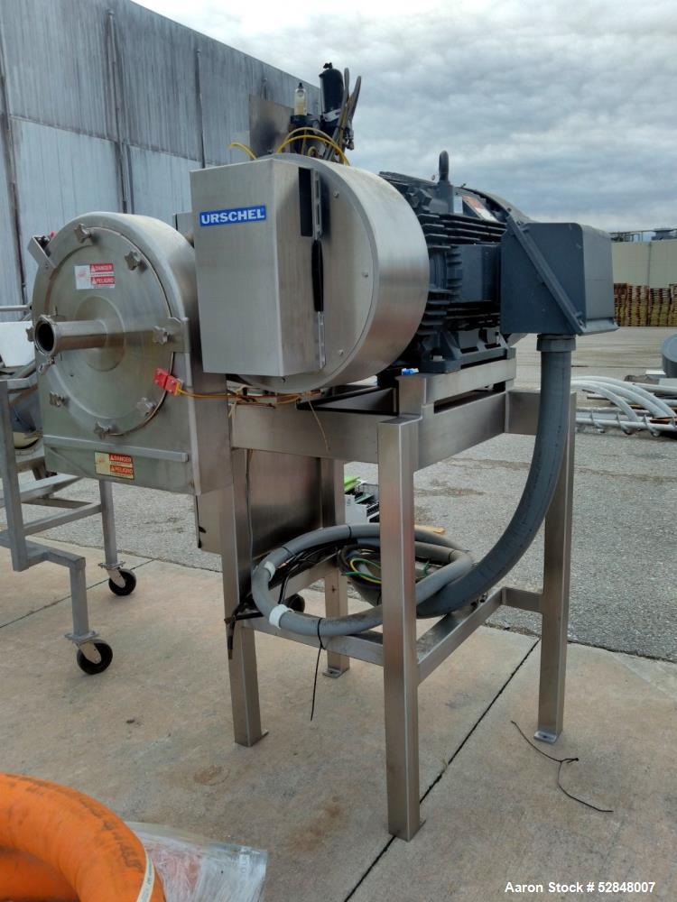 Used Urschel Comitrol Processor, Model 9300. Equipped with 12" microcut head and impeller. Approximate 200hp motor. Maximum product infeed 3/8" (9.5mm) to a slurry depending on microcut head used. Ap...