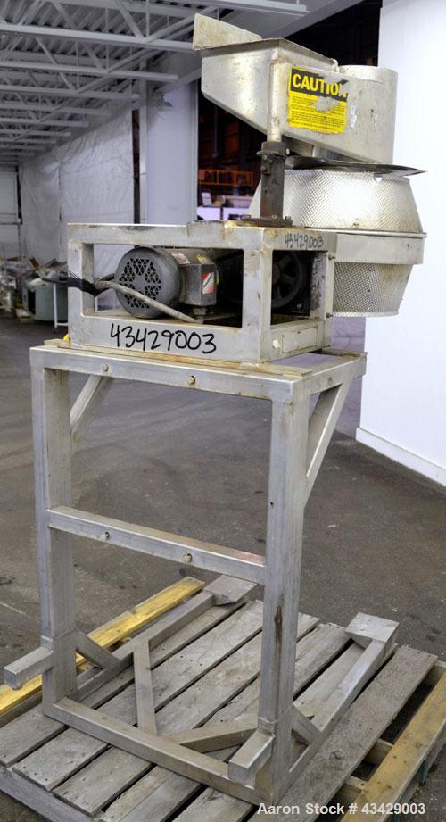 Used Urschel Slicer, Model CC, Stainless Steel. Maximum input product size 3-1/2”. Unit consists of: Swing away feed hopper, upper, and lower discharge chute, bearing housing, and cutting head suppor...