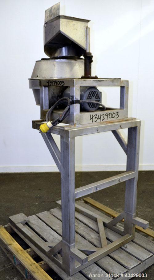 Used Urschel Slicer, Model CC, Stainless Steel. Maximum input product size 3-1/2”. Unit consists of: Swing away feed hopper, upper, and lower discharge chute, bearing housing, and cutting head suppor...