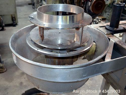 Used Urschel Slicer, Model CC, Stainless Steel. Maximum input product size 3-1/2”. Unit consists of: Swing away feed hopper, upper, and lower discharge chute, bearing housing, and cutting head suppor...