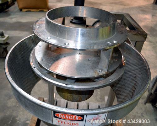 Used Urschel Slicer, Model CC, Stainless Steel. Maximum input product size 3-1/2”. Unit consists of: Swing away feed hopper, upper, and lower discharge chute, bearing housing, and cutting head suppor...