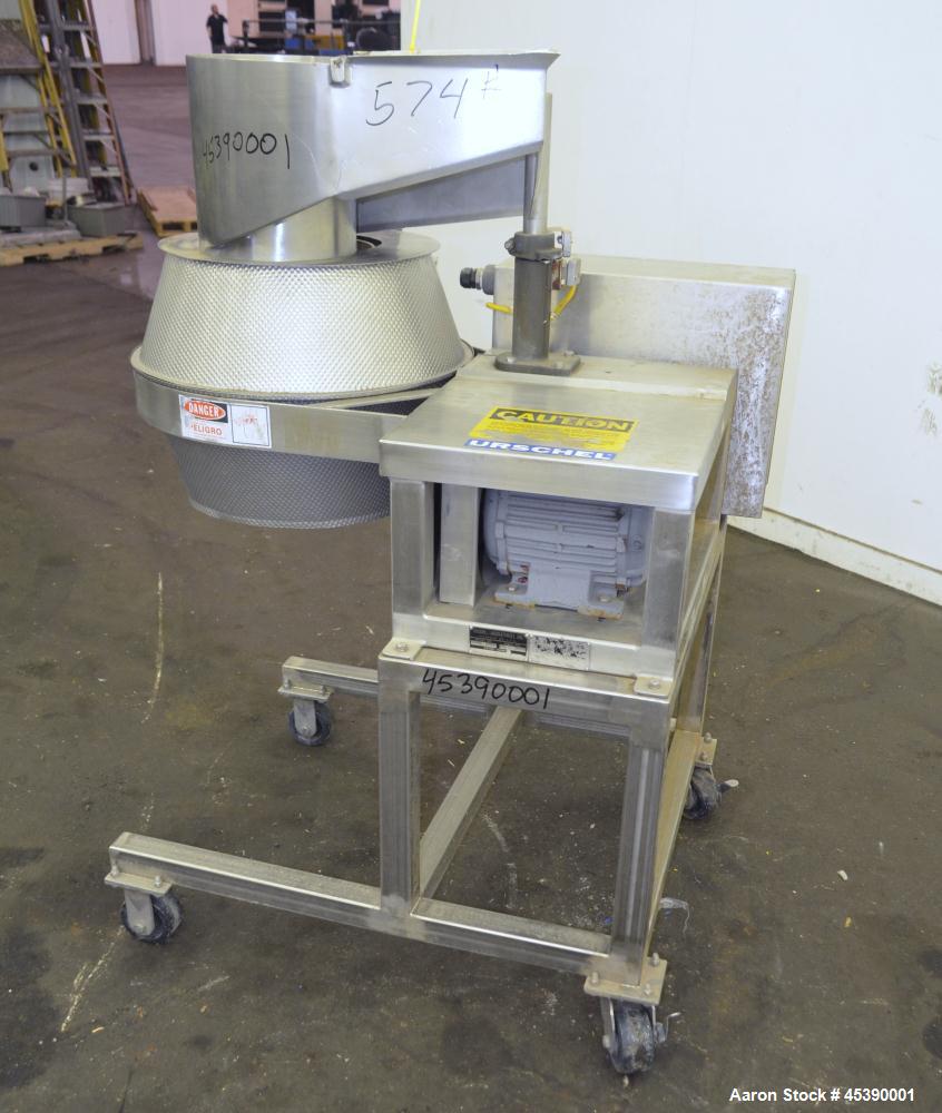 Used Urschel Slicer, Model CC, Stainless Steel. Maximum input product size 3-1/2". Unit consists of (1) swing away feed hopper, upper, and lower discharge chute, bearing housing, and cutting head sup...