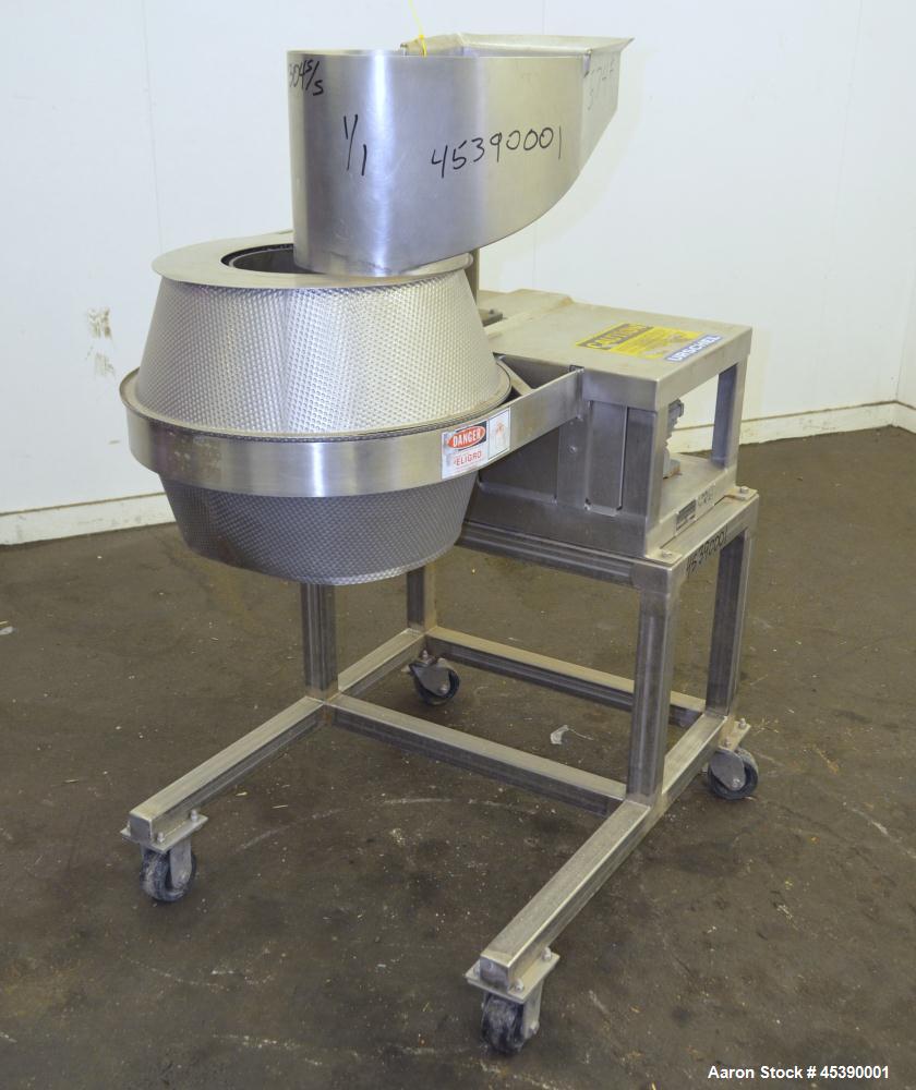 Used Urschel Slicer, Model CC, Stainless Steel. Maximum input product size 3-1/2". Unit consists of (1) swing away feed hopper, upper, and lower discharge chute, bearing housing, and cutting head sup...